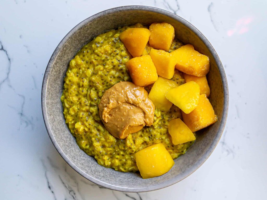 golden turmeric oatmeal with mango