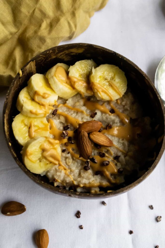 PB2 oatmeal in a bowl with banana