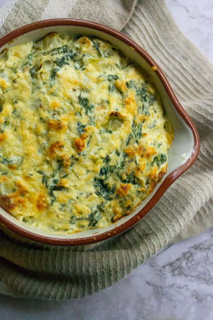 Top view of healthy spinach artichoke dip.