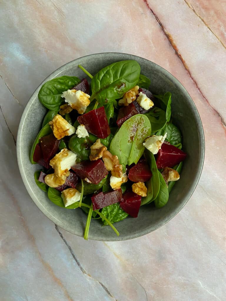 overhead shot of beetroot goat cheese salad