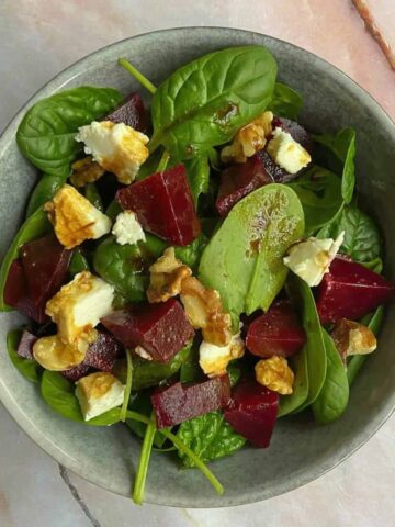 Beetroot goat cheese salad in a bowl.