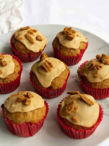 Vegan biscoff cupcakes on a plate.