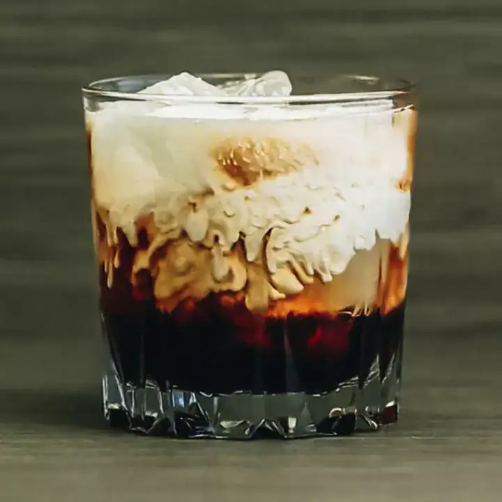 White Russian cocktail served in a rocks glass with ice.